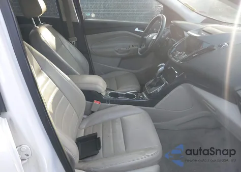 2014 Ford Escape Titanium z USA, uszkodzony, nr VIN 1FMCU9J91EUB11171